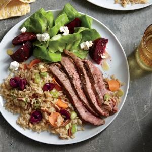 Grilled flank steak with cherry-pecan rice