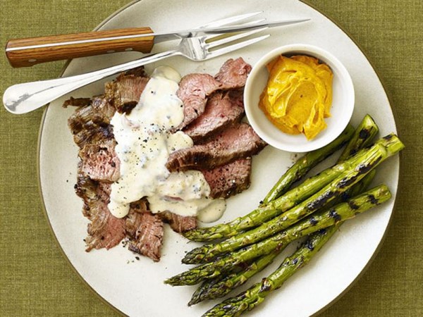Grilled flank steak with Gorgonzola cream sauce and asparagus