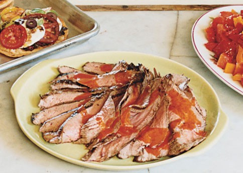 Grilled flank steak with spicy pepper and watermelon salad