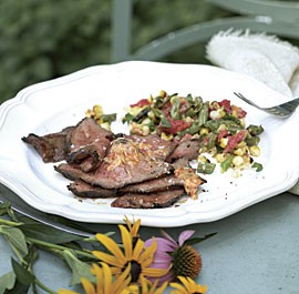 Grilled flat-iron steak with charred tomato butter and grilled succotash