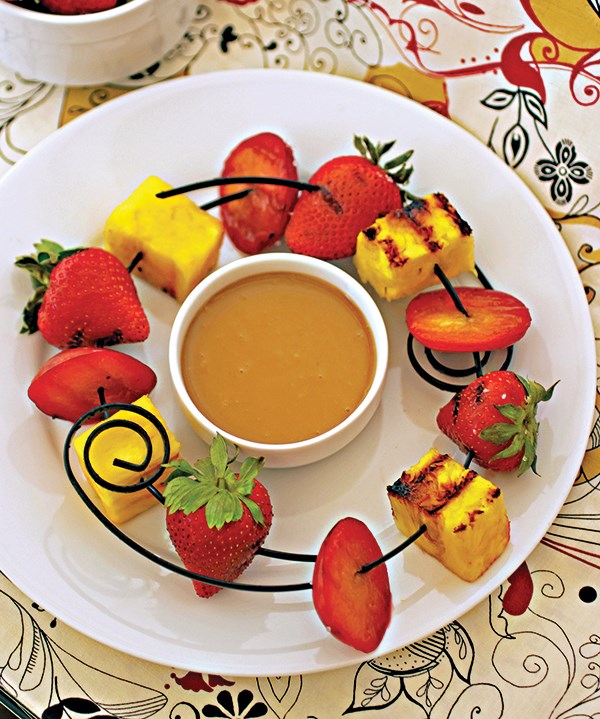 Grilled fruit satays with pineapple-coconut peanut sauce