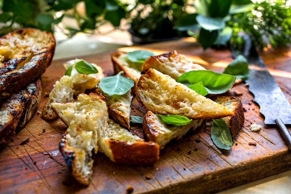 Grilled garlic bread with basil and Parmesan