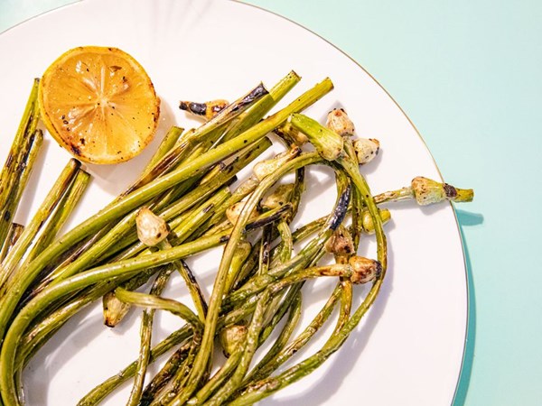 Grilled garlic scapes