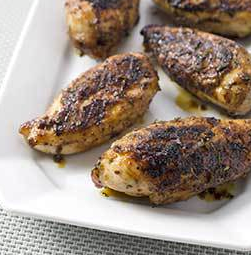 Grilled glazed bone-in chicken breasts
