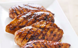 Grilled glazed boneless chicken breasts