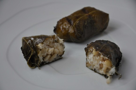 Grilled grape leaves stuffed with lemony goat cheese