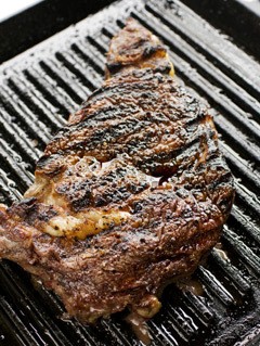 Grilled grass-fed steak with salsa verde 