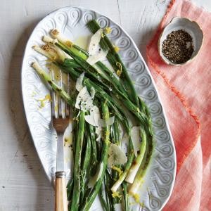 Grilled green onions with lemon and Parmesan