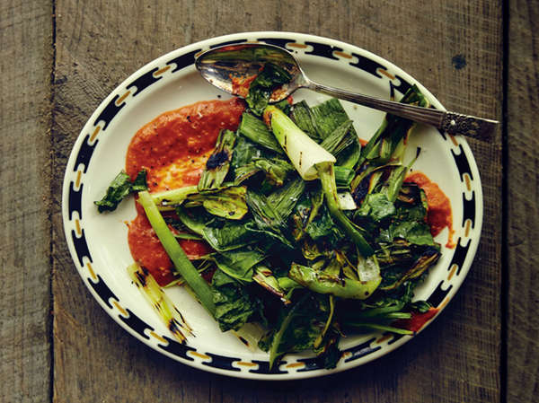 Grilled greens and leek tops with chile-garlic sauce