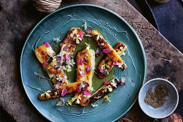 Grilled haloumi with honey and wild flowers