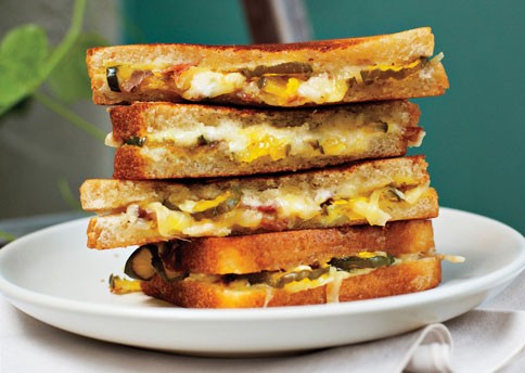 Grilled ham, cheese, and pickle sandwiches