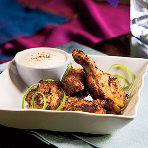 Grilled herbed chicken drumettes with white barbecue sauce