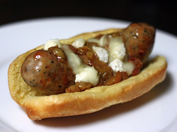Grilled Italian sausages with roasted grapes and sheep's milk cheese
