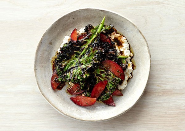 Grilled kale salad with ricotta and plums