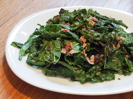 Grilled kale salad with warm bacon vinaigrette