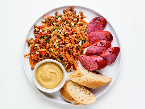 Grilled kielbasa with lentil salad