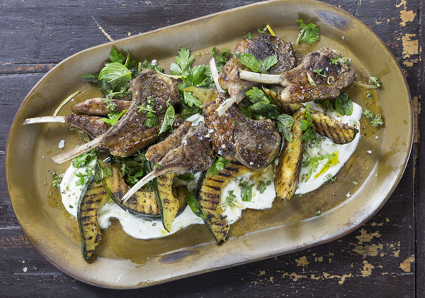 Grilled lamb chops and squash with herb salad and sunchokes