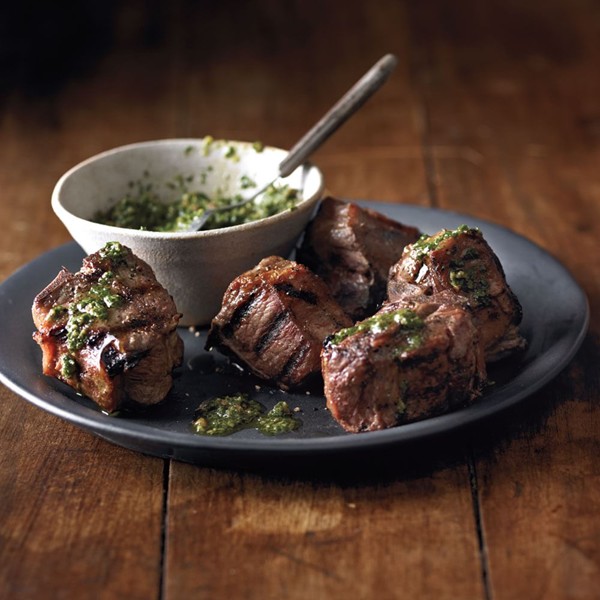 Grilled lamb chops with herb-almond pesto (Costole d'agnello alla brace)