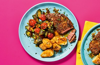 Grilled lamb steaks with smoky mint butter & charred Mediterranean veg