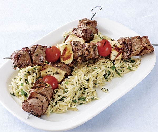 Grilled lamb, tomato, and hallloumi skewers with orzo salad
