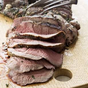 Grilled leg of lamb with mint-garlic rub