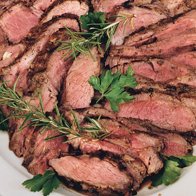 Grilled leg of lamb with rosemary, garlic, and mustard