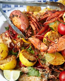 Grilled lobster and corn on the cob with sun-dried chile butter