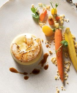 Grilled Maine lobster with toasted cashew, baby carrots, and lobster-ginger sabayon