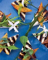 Grilled manouri cheese with caramelized plums