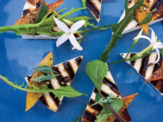 Grilled manouri cheese with caramelized plums