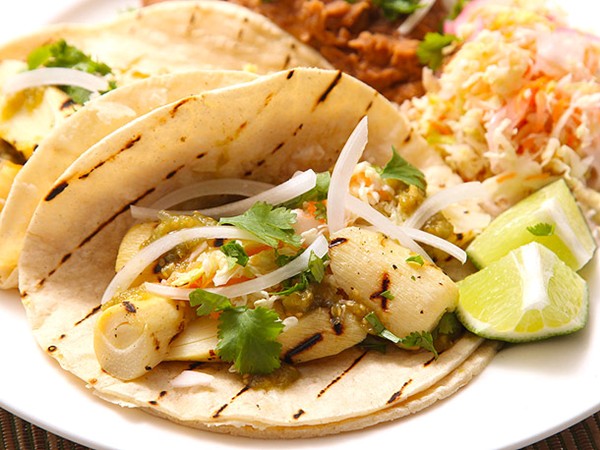 Grilled marinated heart of palm tacos with spicy cabbage slaw