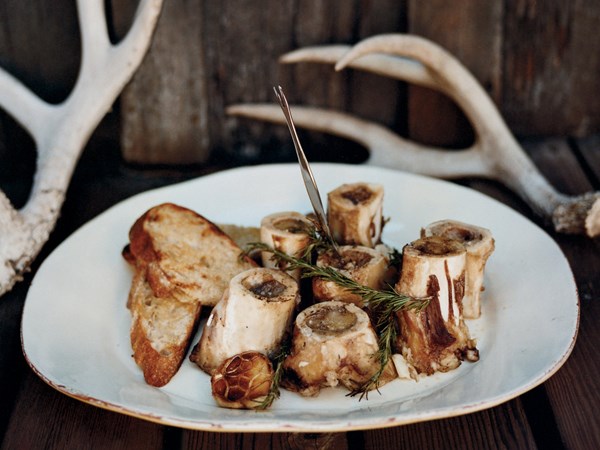 Grilled marrow bones with rosemary-lemon bruschetta