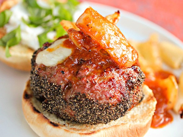 Grilled mozzarella-stuffed Italian sausage burgers with vinegar peppers