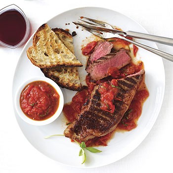 Grilled New York steaks with San Marzano sauce
