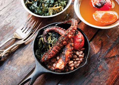 Grilled octopus, kale, tomatoes, and beans