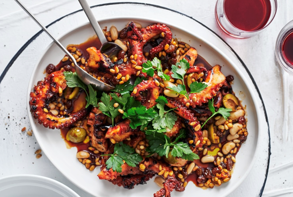 Grilled octopus with agrodolce, pine nuts and green olives