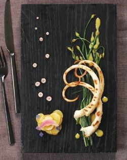 Grilled octopus with garlic chives and fingerling potato salad