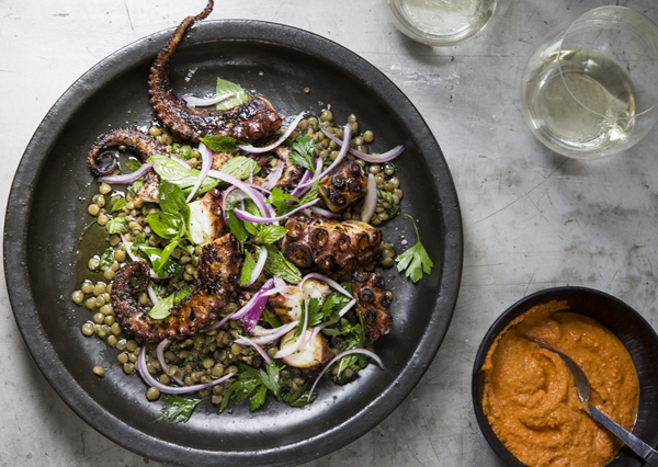 Grilled octopus with green lentils and romesco