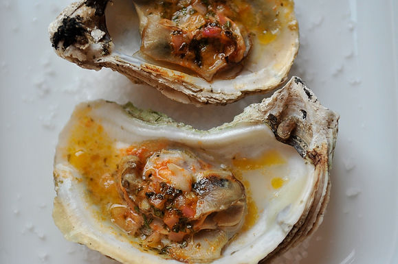 Grilled (or broiled) oysters with a Sriracha lime butter