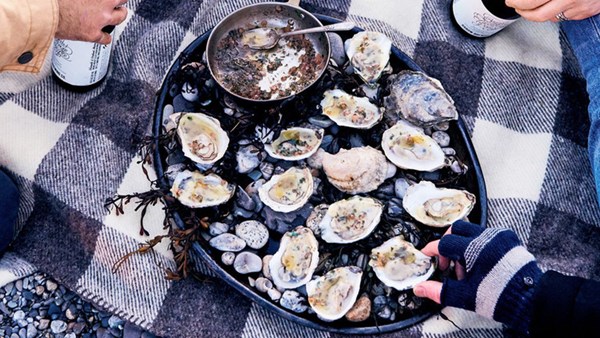 Grilled oysters with compound brown butter