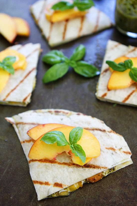 Grilled peach, pesto, and mozzarella quesadillas