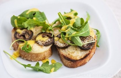 Grilled pear and pickled walnuts with cheddar on toast