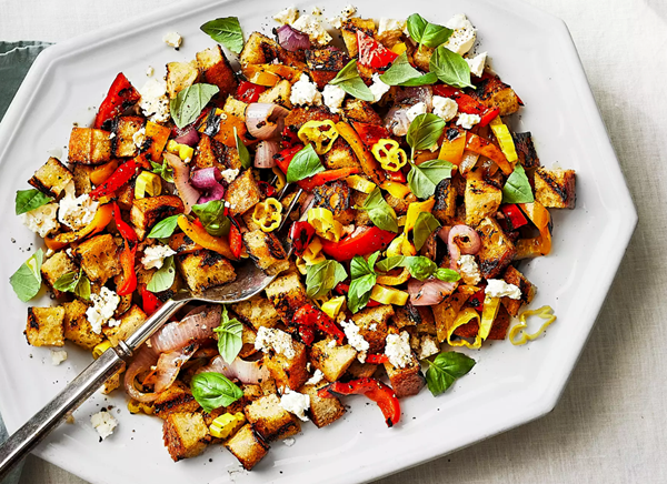 Grilled pepper and onion panzanella with peperoncini vinaigrette