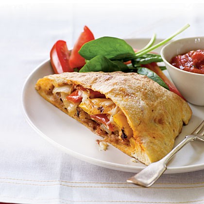Grilled pepper, onion and sausage calzones