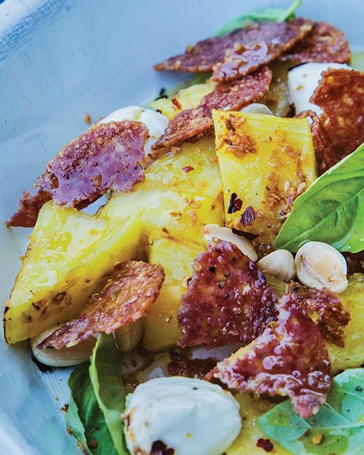 Grilled pineapple salad with pepperoni, mozzarella, & almonds