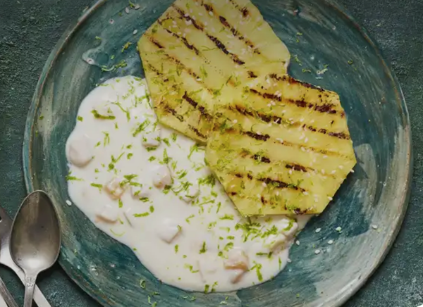 Grilled pineapple with peach Activia, lime zest and sesame seeds