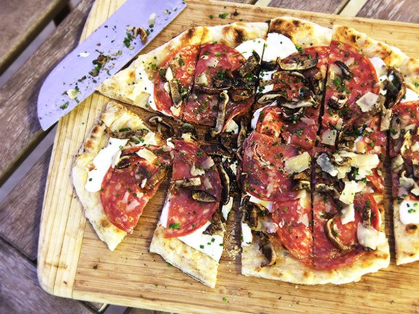 Grilled pizza with grilled shiitake, sopressata, and Parmesan