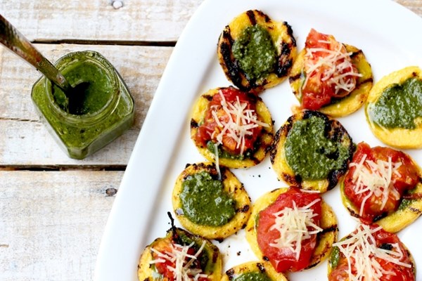 Grilled polenta bites with pistachio pesto & grilled tomatoes