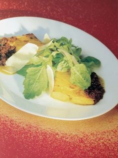 Grilled polenta with olive tapenade, Parmesan and rocket