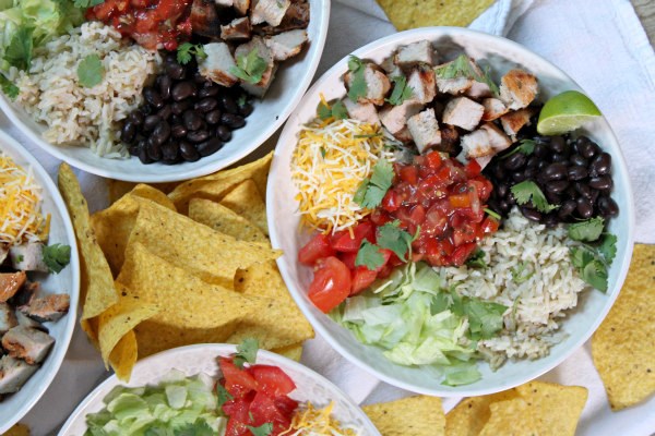 Grilled pork burrito bowls with avocado-limes crema